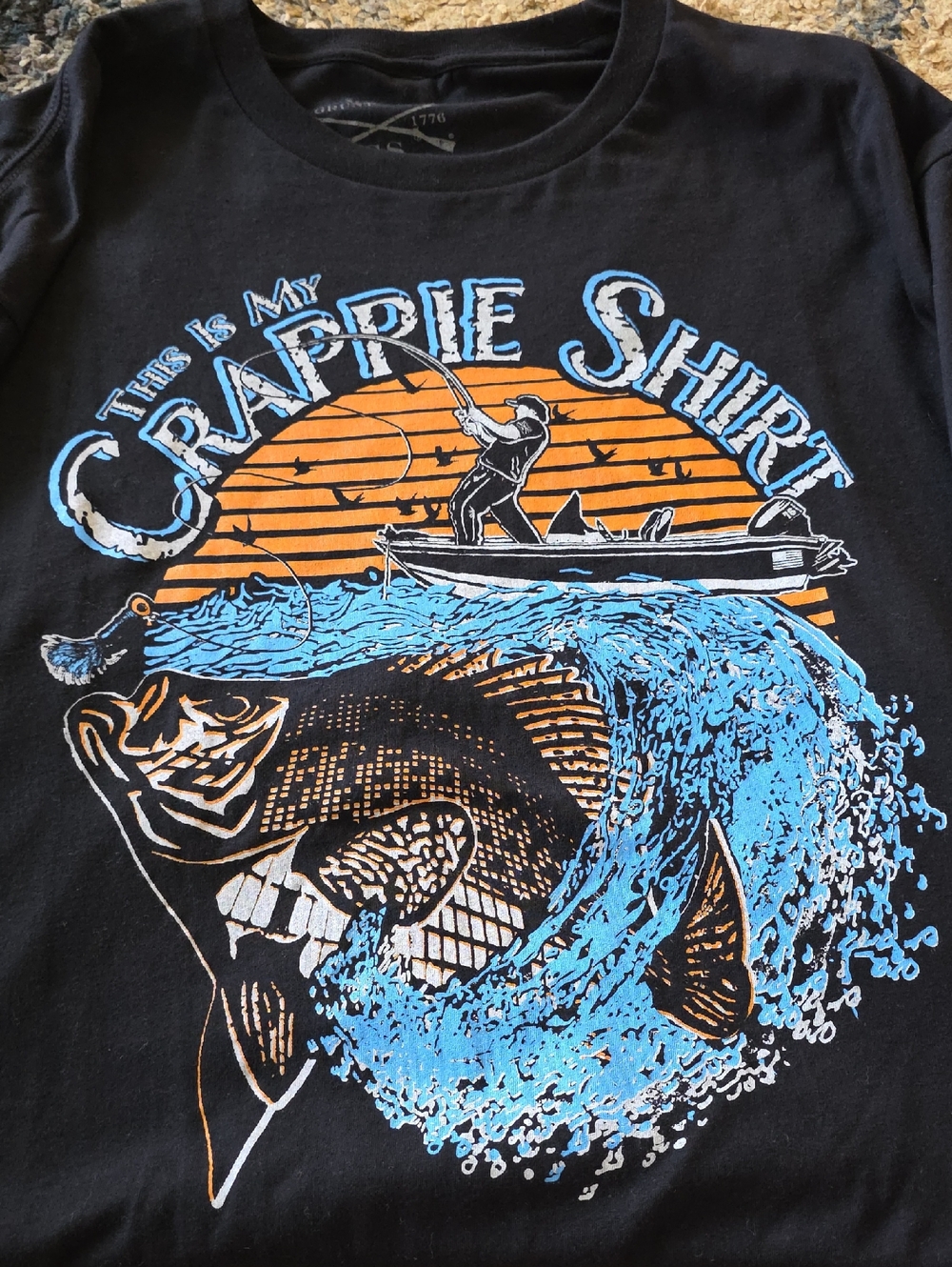 Grunt Style Black Tee with Blue and Orange Fishing Graphic
